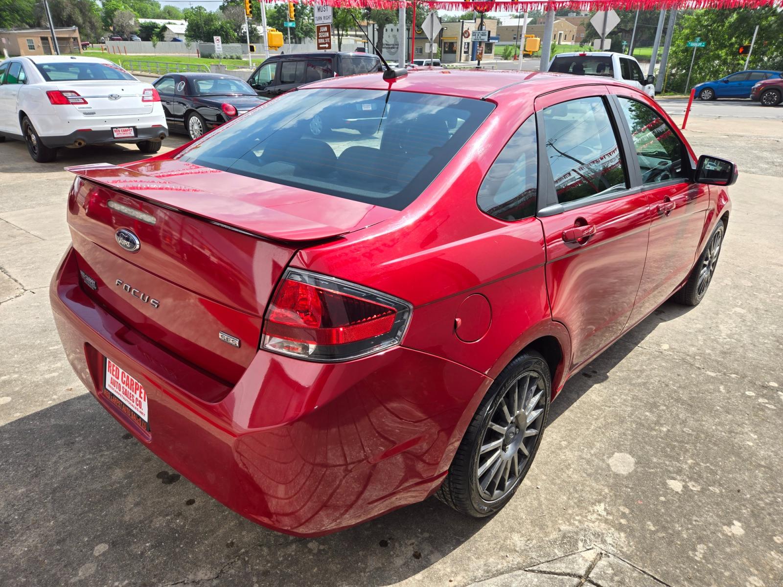 2010 Ford Focus (1FAHP3GN7AW) with an 2.0L I4 F DOHC 16V engine, Automatic transmission, located at 503 West Court, Seguin, TX, 78155, (830) 379-3373, 29.568621, -97.969803 - 2010 Ford Focus SES Sedan with a 2.0L I4 F DOHC 16V, Automatic, Tilt, Cruise, AM/FM/CD/AUX Stereo, Power Windows, Locks and Side Mirrors, Bluetooth, Alloy Wheels, Rear Defroster and more!! - Photo #2